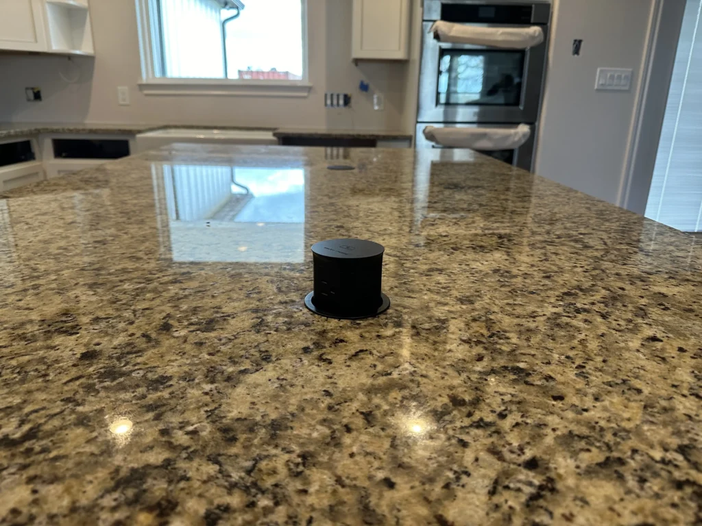 Granite countertops with popup electric plug