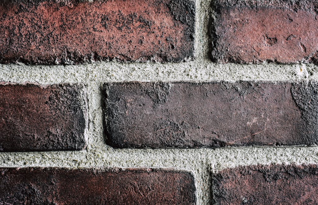 Red Brick Wallchoose from Granite, Quartzite, Vicostone, Cambria, Marble, Soapstone, Onyx, and all Natural stone Slabs.