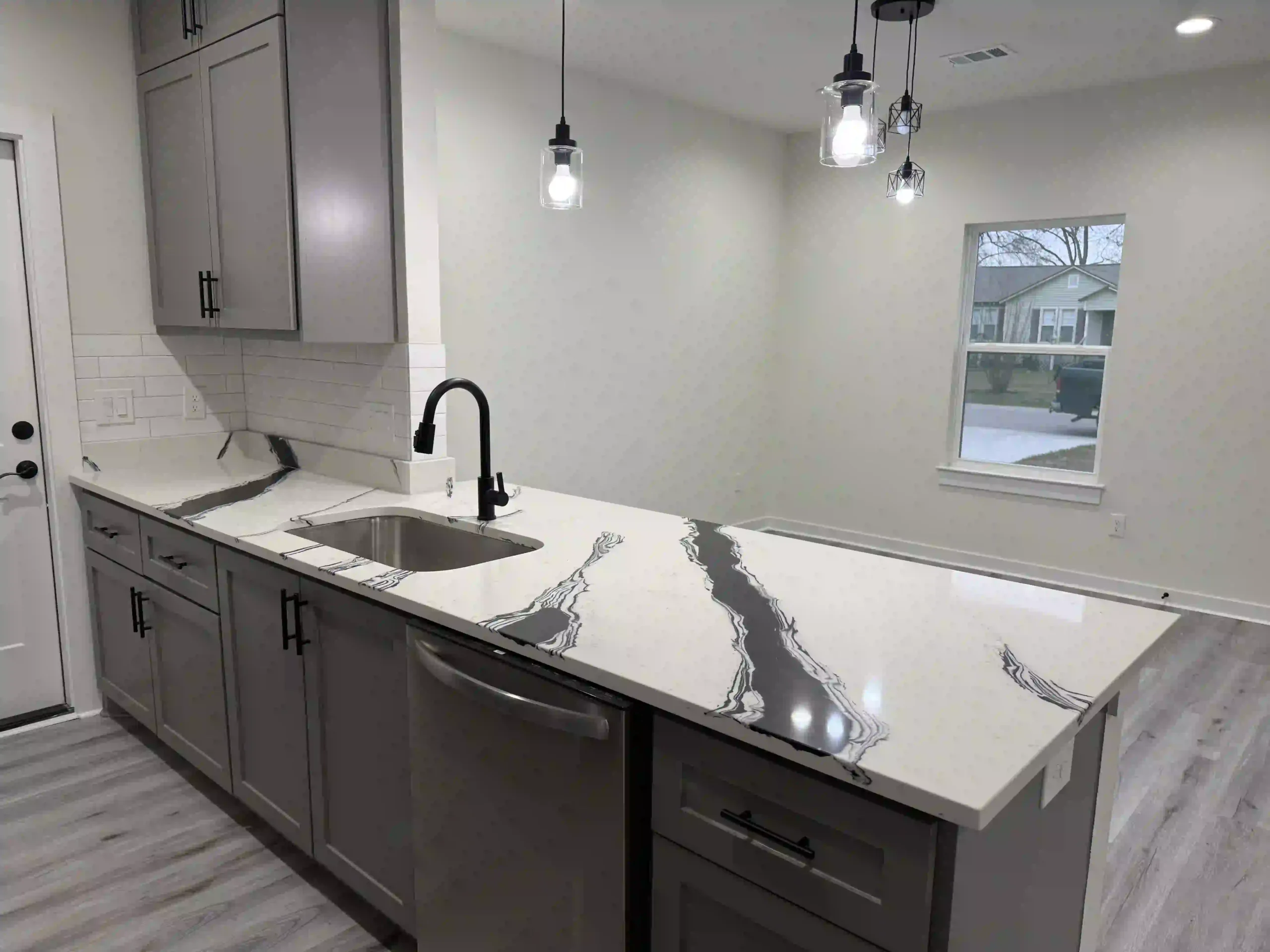 Quartz countertops, Tx Granite countertops, Tx Quartzite countertops Tx Quartz Countertops Houston TX. Granite Countertops Houston TX. Quartzite Countertops Houston TX. Marble Countertops Houston TX. Quartz Countertops Austin TX Granite Countertops Austin TX Quartzite Countertops Austin TX Marble Countertops Austin TX Quartz Countertops Bastrop TX Granite Countertops Bastrop TX Quartzite Countertops Bastrop TX Marble Countertops Bastrop TX Quartz Countertops College Station TX Granite Countertops College Station TX Quartzite Countertops College Station TX Marble Countertops College Station TX Quartz Countertops Bryan TX Granite Countertops Bryan TX Quartzite Countertops Bryan TX Marble Countertops Bryan TX. Granite countertops Quartz countertops Marble countertops Butcher block countertops Concrete countertops Soapstone countertops Laminate countertops Solid surface countertops Recycled glass countertops Stainless steel countertops Waterfall countertops Custom kitchen countertops Countertop installation Countertop replacement Affordable countertops Luxury kitchen countertops Eco-friendly countertops Heat-resistant countertops Scratch-resistant countertops White granite countertops Black quartz countertops Marble-look quartz countertops Modern kitchen countertops Rustic kitchen countertops Countertop contractors
Quartz countertops, Tx Granite countertops, Tx Quartzite countertops Tx Quartz Countertops Houston TX. Granite Countertops Houston TX. Quartzite Countertops Houston TX. Marble Countertops Houston TX. Quartz Countertops Austin TX Granite Countertops Austin TX Quartzite Countertops Austin TX Marble Countertops Austin TX Quartz Countertops Bastrop TX Granite Countertops Bastrop TX Quartzite Countertops Bastrop TX Marble Countertops Bastrop TX Quartz Countertops College Station TX Granite Countertops College Station TX Quartzite Countertops College Station TX Marble Countertops College Station TX Quartz Countertops Bryan TX Granite Countertops Bryan TX Quartzite Countertops Bryan TX Marble Countertops Bryan TX. Granite countertops Quartz countertops Marble countertops Butcher block countertops Concrete countertops Soapstone countertops Laminate countertops Solid surface countertops Recycled glass countertops Stainless steel countertops Waterfall countertops Custom kitchen countertops Countertop installation Countertop replacement Affordable countertops Luxury kitchen countertops Eco-friendly countertops Heat-resistant countertops Scratch-resistant countertops White granite countertops Black quartz countertops Marble-look quartz countertops Modern kitchen countertops Rustic kitchen countertops Countertop contractors
Sleek open-plan kitchen with modern decor, featuring stainless appliances and bar seating.

Countertops TX, Quartz countertops TX, Granite countertops TX, Quartzite Countertops TX, Kitchen countertops, Quartz, Granite Countertops, Quartzite, Marble, Silestone, MSI, Countertops near me, Round Top, TX, Quartzite Countertops Katy, TX, Quartzite Countertops Sealy, TX, Quartzite Countertops Fulshear, TX, Quartzite Countertops Columbus, TX, Quartzite Countertops Bellville, TX, Quartzite Countertops Brenham, TX, Quartzite Countertops Round Top, TX, Quartzite Countertops Tomball, TX, Quartzite Countertops Eagle Lake, TX, Quartzite Countertops Wharton, TX, Quartzite Countertops El Campo, TX, Quartzite Countertops Clear Lake, TX, Quartzite Countertops Friendswood, TX, Quartzite Countertops Texas City, TX, Quartzite Countertops Pearland, TX, Quartzite Countertops Spring, TX, Quartzite Countertops Lake Jackson, TX, Quartzite Countertops Brazoria, TX, Quartzite Countertops West Columbia, TX, Quartzite Countertops Baytown, TX, Quartzite Countertops Kingwood, TX, Quartzite Countertops The Woodlands, TX, Quartzite Countertops Fort Bend County, TX, Quartzite Countertops Bay City, TX, Quartzite Countertops League City, TX, Quartzite Countertops Sugar Land, TX, Quartzite Countertops Hempstead, TX, Quartzite Countertops Richmond, TX, Quartzite Countertops Humble, TX, Quartzite Countertops Jersey Village, TX, Quartzite Countertops Cypress, TX, Quartzite Countertops Galveston, TX, Quartzite Countertops Cinco Ranch, TX, Quartzite Countertops Pecan Grove, TX, Quartzite Countertops Sienna, TX, Quartzite Countertops Hockley, TX, Quartzite Countertops Magnolia, TX, Quartzite Countertops Cleveland, TX, Quartzite Countertops Conroe, TX, Quartzite Countertops Montgomery, TX, Quartzite Countertops Rose Hill, TX, Quartzite Countertops West University Place, TX, Quartzite Countertops Kemah, TX, Quartzite Countertops Weston Lakes, TX, Quartzite Countertops Smithville, TX, Quartzite Countertops Bastrop, TX, Quartzite Countertops Austin, TX, Quartzite Countertops Anderson Mill, TX, Quartzite Countertops Cedar Park, TX, Quartzite Countertops Channelview, TX, Quartzite Countertops Clear Lake City, TX, Quartzite Countertops Crosby, TX, Quartzite Countertops Dayton, TX, Quartzite Countertops Deer Park, TX, Quartzite Countertops Dickinson, TX, Quartzite Countertops Freeport, TX, Quartzite Countertops Georgetown, TX, Quartzite Countertops Jamaica Beach, TX, Quartzite Countertops Jollyville, TX, Quartzite Countertops Kyle, TX, Quartzite Countertops Lakeway, TX, Quartzite Countertops Leader, TX, Quartzite Countertops Missouri City, TX, Quartzite Countertops Pasadena, TX, Quartzite Countertops Porter, TX, Quartzite Countertops Rosenberg, TX, Quartzite Countertops Rosharon, TX, Quartzite Countertops Round Rock, TX, Quartzite Countertops Santa Fe, TX, Quartzite Countertops Seabrook, TX, Quartzite Countertops Shenandoah, TX, Quartzite Countertops Stafford, TX, Quartzite Countertops Taylor, TX, Quartzite Countertops Waller, TX, Quartzite Countertops Webster, TX, Eco-friendly countertops, Acrylic countertops, Copper countertops, Durable countertops, Patterned countertops, Textured countertops, Budget countertops, Concrete overlay countertops, Modular countertops, Compact laminate countertops, Resin countertops, Cultured marble countertops, Countertop finishes, Non-porous countertops, Heat-tolerant countertops, Seamless countertops, Countertop restoration, Countertop makeover, Countertop design ideas, Countertop remodeling, Countertop installation cost, Countertop installers near me, Exotic stone countertops, Low-maintenance countertops, Modern kitchen countertops, Stone veneer countertops, Countertop moldings, Countertop transitions, Quartz countertops cost, Custom bathroom countertops, Countertop sealing services, Hygienic countertops, Scratch-proof countertops, Countertop upgrades, High-gloss countertops, Countertop overlays, Affordable kitchen countertops, Countertop showrooms, Removable countertops, Stone slab countertops, Reclaimed wood countertops, Contemporary countertops, Classic countertops, Decorative countertops, Countertop fabrication near me, Prefab countertops, Easy-to-clean countertops, Transitional countertops, UV-resistant countertops, Countertops near me, Granite countertops near me, Quartz countertops near me, Cheap countertops near me, Kitchen countertops near me, Bathroom countertops near me, Custom countertops near me, Affordable countertops near me, Local countertop installation, Countertop showrooms near me, Quartz Countertops Houston TX, Granite Countertops Houston TX, Quartzite Countertops Houston TX, Marble Countertops Houston TX, Luxury marble countertops for modern kitchens, Scratch-resistant quartz countertops for families, Custom edge designs for granite countertops, Best countertop options for small kitchen spaces, Low-maintenance countertop materials for busy homes, Where to buy pre-cut butcher block countertops, Top-rated kitchen countertop installers near me, How to clean and polish stone countertops, Budget-friendly countertop ideas for a kitchen upgrade, Heat- and stain-resistant countertops for outdoor use, Quartz Countertops Austin TX, Granite Countertops Austin TX, Quartzite Countertops Austin TX, Marble Countertops Austin TX, Quartz Countertops Bastrop TX, Granite Countertops Bastrop TX, Quartzite Countertops Bastrop TX, Marble Countertops Bastrop TX, Quartz Countertops College Station TX, Granite Countertops College Station TX, Quartzite Countertops College Station TX, Marble Countertops College Station TX, Quartz Countertops Bryan TX, Granite Countertops Bryan TX, Quartzite Countertops Bryan TX, Marble Countertops Bryan TX.

Granite Countertops – Near Austin, TX
Quartzite Countertops – Near Friendswood, TX
Marble & Stone Countertops – Nearby
Quartz Countertops – Austin, TX
Kitchen Countertops – Near Houston, TX
Quartz Countertops – Galveston, TX & Houston, TX
Quartz Countertops – Near Austin TX.
Quartz Countertops – Near Fulshear & Rosenberg, TX
Quartz Countertops – Missouri City, TX & Near Brenham, TX
Quartz Countertops – Baytown, TX
Quartz countertop installers in Bellville TX
Top-rated quartz countertops near Bellville TX
Affordable quartz countertops Bellville TX
White quartz countertops in Bellville TX homes
Best quartz countertop colors for kitchens in Bellville TX
Modern quartz countertops Bellville TX
Quartz countertop fabricators in Bellville TX
Polished quartz countertops near Bellville TX
Honed quartz countertops Bellville TX
Quartz countertop care and maintenance Bellville TX
Quartzite countertop installers in Bellville TX
Best quartzite colors for kitchens Bellville TX
Natural quartzite countertops near Bellville TX
Luxury quartzite countertops Bellville TX
Affordable quartzite countertop options in Bellville TX
Honed quartzite countertops Bellville TX
Quartzite bathroom countertops Bellville TX
Custom quartzite countertops Bellville TX
Outdoor quartzite countertops Bellville TX
Quartzite countertop fabricators Bellville TX
Granite Countertops Long-Tail Keywords – Bellville, TX
Granite countertop installers in Bellville TX
Top granite countertop colors Bellville TX
Affordable granite countertops Bellville TX
Best granite countertop companies in Bellville TX
Custom granite countertops Bellville TX
Black granite countertops Bellville TX
White granite countertops Bellville TX
Granite kitchen countertops Bellville TX
Granite countertop care Bellville TX
Honed granite countertops Bellville TX
Marble countertop installers Bellville TX
Top-rated marble countertops Bellville TX
Luxury marble countertops Bellville TX
Calacatta marble countertops Bellville TX
White marble countertops Bellville TX
Affordable marble countertops Bellville TX
Honed marble countertops Bellville TX
Marble bathroom countertops Bellville TX
Custom marble countertops Bellville TX
Best marble countertop care Bellville TX
Top-rated countertop installers Bellville TX
Affordable kitchen countertops Bellville TX
Custom countertops near Bellville TX
Quartz, granite, and marble countertops Bellville TX
Bathroom countertops Bellville TX
Outdoor kitchen countertops Bellville TX
Best countertop companies Bellville TX
Modern kitchen countertops Bellville TX
Countertop installation near Bellville TX
Residential and commercial countertops Bellville TX

Quartz countertop installers in Sealy TX
Top-rated quartz countertops near Sealy TX
Affordable quartz countertops Sealy TX
White quartz countertops for Sealy TX kitchens
Best quartz countertop colors for homes in Sealy TX
Modern quartz countertops Sealy TX
Custom quartz countertops near Sealy TX
Honed quartz countertops Sealy TX
Quartz countertop care and maintenance Sealy TX
Luxury quartz countertops Sealy TX
Quartzite countertop installers in Sealy TX
Best quartzite colors for kitchens Sealy TX
Natural quartzite countertops near Sealy TX
Luxury quartzite countertops Sealy TX
Affordable quartzite countertop options in Sealy TX
Honed quartzite countertops Sealy TX
Quartzite bathroom countertops Sealy TX
Outdoor quartzite countertops Sealy TX
Quartzite countertop fabricators Sealy TX
Custom quartzite slabs in Sealy TX
Granite countertop installers in Sealy TX
Top granite countertop colors Sealy TX
Affordable granite countertops Sealy TX
Custom granite countertops Sealy TX
Best granite countertop companies in Sealy TX
White granite countertops Sealy TX
Black granite countertops Sealy TX
Granite kitchen countertops Sealy TX
Granite countertop care and cleaning Sealy TX
Honed granite countertops Sealy TX
Marble countertop installers Sealy TX
Top-rated marble countertops Sealy TX
Luxury marble countertops Sealy TX
Calacatta marble countertops Sealy TX
White marble countertops Sealy TX
Affordable marble countertops Sealy TX
Marble bathroom countertops Sealy TX
Custom marble countertops Sealy TX
Honed marble countertops Sealy TX
Best marble countertop care Sealy TX
General Countertop Keywords – Sealy, TX
Top-rated countertop installers Sealy TX
Affordable kitchen countertops Sealy TX
Custom countertops near Sealy TX
Quartz, granite, and marble countertops Sealy TX
Bathroom countertops Sealy TX
Outdoor kitchen countertops Sealy TX
Best countertop companies Sealy TX
Modern kitchen countertops Sealy TX
Countertop installation near Sealy TX
Residential and commercial countertops Sealy TX


Quartz Countertops Sealy TX
Quartz Countertops Bellville TX
Quartz Countertop Installers Sealy TX
Quartz Countertop Installers Bellville TX
Top-Rated Quartz Countertops Sealy TX
Top-Rated Quartz Countertops Bellville TX
Custom Quartz Countertops Sealy TX
Custom Quartz Countertops Bellville TX
Affordable Quartz Countertops Sealy TX
Affordable Quartz Countertops Bellville TX
Quartzite Countertops
Quartzite Countertops Sealy TX
Quartzite Countertops Bellville TX
Quartzite Countertop Installers Sealy TX
Quartzite Countertop Installers Bellville TX
Top-Rated Quartzite Countertops Sealy TX
Top-Rated Quartzite Countertops Bellville TX
Custom Quartzite Countertops Sealy TX
Custom Quartzite Countertops Bellville TX
Affordable Quartzite Countertops Sealy TX
Affordable Quartzite Countertops Bellville TX
Granite Countertops
Granite Countertops Sealy TX
Granite Countertops Bellville TX
Granite Countertop Installers Sealy TX
Granite Countertop Installers Bellville TX
Top-Rated Granite Countertops Sealy TX
Top-Rated Granite Countertops Bellville TX
Custom Granite Countertops Sealy TX
Custom Granite Countertops Bellville TX
Affordable Granite Countertops Sealy TX
Affordable Granite Countertops Bellville TX
Marble Countertops
Marble Countertops Sealy TX
Marble Countertops Bellville TX
Marble Countertop Installers Sealy TX
Marble Countertop Installers Bellville TX
Top-Rated Marble Countertops Sealy TX
Top-Rated Marble Countertops Bellville TX
Custom Marble Countertops Sealy TX
Custom Marble Countertops Bellville TX
Affordable Marble Countertops Sealy TX
Affordable Marble Countertops Bellville TX.

Quartz Countertops On Sale Nearby
Affordable Quartz Countertops On Sale Nearby
Best Quartz Countertops On Sale Nearby
Custom Quartz Countertops On Sale Nearby
Modern Quartz Countertops On Sale Nearby
Luxury Quartz Countertops On Sale Nearby
Top-Rated Quartz Countertops On Sale Nearby
High-Quality Quartz Countertops On Sale Nearby
Quartz Countertops On Sale Nearby For Kitchens
Quartz Countertops On Sale Nearby For Bathrooms
Discount Quartz Countertops On Sale Nearby
Quartz Countertop Installers On Sale Nearby
Quartz Countertops On Sale Nearby With Free Installation
Quartz Countertops On Sale Nearby With No Deposit
Best Deals On Quartz Countertops On Sale Nearby
Quartz Countertops On Sale Nearby – Limited Time Offer
Quartz Countertops On Sale Nearby – Exclusive Discounts
Quartz Countertops On Sale Nearby – Get A Free Quote
Quartz Countertops On Sale Nearby – Top Deals Today
Quartz Countertops On Sale Nearby – Affordable Prices
Quartz Countertops On Sale Nearby – Best Value
Quartz Countertops On Sale Nearby – Shop Now
Quartz Countertops On Sale Nearby – Special Offers
Quartz Countertops On Sale Nearby – Limited Stock
Quartz Countertops On Sale Nearby – Order Today

Granite countertops near me
Quartz countertops near me
Marble countertops near me
Kitchen countertops near me
Bathroom countertops near me
Countertop installation near me
Countertop installers near me
Quartzite countertops near me
Custom countertops near me
Affordable countertops near me
Best countertops for kitchen near me
Granite vs quartz countertops near me
Countertop fabricators near me
Solid surface countertops near me
Countertop replacement near me
White quartz countertops near me
Black granite countertops near me
Countertop remodeling near me
Laminate countertops near me
Butcher block countertops near me


Countertop Installation Quartzite Countertops. Countertop Installation Calacatta Lorenzo Quartz Countertops Kingwood TX. Granite Countertops Kingwood TX. Quartzite Countertops Kingwood TX. Marble Countertops Kingwood TX. Quartz Countertops Houston TX. Granite Countertops Houston TX. Quartzite Countertops Houston TX. Marble Countertops Houston TX.

Countertops QUARTZ, granite, quartzite. Katy, Sealy, Fulshear, Columbus, Bellville, Brenham, Tomball, Eagle Lake, Wharton, El Campo, Clear Lake, Friendswood, Texas City, Pearland, Spring, Lake Jackson, Brazoria, West Columbia, Baytown, Kingwood, The Woodlands, Fort Bend County, Bay City, League City Texas. Sugar Land, Hempstead, Richmond, Humble, Jersey Village, Cypress, Galveston, Cinco Ranch, Pecan Grove, Sienna, Hockley, Magnolia, Cleveland, Conroe, Montgomery, Rose Hill, West University Place, Kemah, Weston Lakes, Smithville, Bastrop. Harris County, Fort Bend County, Waller County, Brazoria County, Galveston County, Montgomery County, Austin County, Colorado County, Wharton County, Travis County, Williamson County, Hays County Austin, Anderson Mill, Cedar Park, Channelview, Clear Lake City, Crosby, Dayton, Deer Park, Dickinson, Freeport, Georgetown, Jamaica Beach, Jollyville, Kyle, Lakeway, Leader, Missouri City, Pasadena, Porter, Rosenberg, Rosharon, Round Rock, Santa Fe, Seabrook, Shenandoah, Stafford, Taylor, Waller, Webster. Near me.

Countertops (Quartz, Granite, Quartzite, Marble, Cambria, Silestone)
Home, Kitchen, and Bathroom Remodeling
Custom Cabinet Installation
Backsplashes and Shower Renovations
Popular Countertop Edge Profiles

🔹 Countertops (Quartz, Granite, Quartzite, Marble, Cambria, Silestone)
Affordable quartz countertops in [City]
Best granite countertop installers near me
Custom marble countertops for kitchens
Quartzite countertops with waterfall edge design
Cambria quartz countertops installation services
Silestone countertops for modern bathrooms
Durable granite countertops for outdoor kitchens
White quartz countertops with grey veining
Black granite countertops for contemporary kitchens
Eco-friendly recycled glass countertops
Cambria® Quartz Surfaces

Cambria® Quartz Surfaces

🔹 Home Remodeling
Full home renovation services in [Sealy, Tx]
Energy-efficient home remodeling contractors
Modern home remodel ideas for small spaces
Luxury home renovation specialists near me
Affordable whole-house remodeling solutions
Historic home restoration and remodeling
Open-concept home remodeling designs
Home addition and remodeling contractors
Smart home integration in remodeling projects
Custom home remodeling with sustainable materials

🔹 Kitchen Remodeling
Custom kitchen remodeling services in [Sealy, Tx]
Modern kitchen renovation ideas with islands
Affordable kitchen remodel packages
Luxury kitchen remodeling with high-end finishes
Small kitchen remodel solutions for apartments
Kitchen cabinet refacing and replacement
Open-concept kitchen remodeling designs
Kitchen backsplash installation services
Energy-efficient kitchen appliances installation
Custom pantry design and installation

🔹 Bathroom Remodeling
Bathroom remodeling contractors in [Sealy, Tx]
Walk-in shower installation and design
Custom bathroom vanities and countertops
Luxury bathroom remodel with spa features
Small bathroom renovation ideas
Accessible bathroom remodeling services
Bathroom tile installation and repair
Eco-friendly bathroom remodeling solutions
Bathroom lighting and fixture upgrades
Heated flooring installation in bathrooms
Kitchen Remodel 
Cambria® Quartz Surfaces

Better Homes & Gardens
🔹 Custom Cabinet Installation
Custom kitchen cabinet design and installation
Bathroom cabinet installation services
Built-in storage solutions for living rooms
Custom closet systems and organizers
Home office custom cabinetry
Garage storage cabinets installation
Entertainment center custom cabinets
Laundry room cabinet installation
Pantry cabinet design and installation
Mudroom built-in cabinets and benches
🔹 Backsplashes and Shower Renovations
Kitchen backsplash tile installation services
Glass mosaic backsplash designs
Subway tile backsplash installation
Custom shower tile installation and design
Walk-in shower remodeling services
Frameless glass shower enclosure installation
Waterproofing solutions for showers
Shower niche and bench installation
Natural stone shower wall installation
LED lighting installation in showers
🔹 Popular Countertop Edge Profiles
Eased edge countertop design
Beveled edge countertops for kitchens
Bullnose edge granite countertop installation
Ogee edge marble countertops
Mitered edge quartz countertops
Dupont edge profile for kitchen islands
Double radius edge countertop design
Waterfall edge quartzite countertops
Half bullnose edge granite installation
Custom countertop edge profiles
Kitchen remodel near me
Affordable kitchen remodel near me
Luxury kitchen remodel near me
Small kitchen remodel near me
Kitchen cabinet installation near me
Custom kitchen remodel near me
Kitchen design services near me
Open concept kitchen remodel near me
Kitchen backsplash installation near me
Kitchen island installation near me
Modern kitchen remodel near me
Farmhouse kitchen remodel near me
Kitchen contractors near me
Complete kitchen renovation near me
High-end kitchen remodel near me
Kitchen flooring install near me
Galley kitchen remodel near me
Energy-efficient kitchen remodel near me
Kitchen pantry renovation near me
Kitchen remodel consultation near me
Breathe New Life Into Your Home with Beautiful Countertops and Remodeling Done Right
Thinking about updating your kitchen, bathroom, or even the whole house? You don’t have to settle for outdated spaces or worn-out finishes. Whether you’re planning a full home renovation or just looking to upgrade your countertops, we’re here to make your vision a reality—with craftsmanship you can trust and materials that truly last.

Our team specializes in custom countertop installation, offering popular and durable options like quartz, granite, marble, and quartzite. From clean, modern quartz in your kitchen to classic marble in the bathroom, we’ll help you choose the perfect surface to match your style and the way you live.

A kitchen remodel is one of the best ways to add value to your home—and make it a place you actually enjoy spending time in. Picture a spacious island with waterfall edges, soft-close drawers, and sleek, durable countertops ready for everyday cooking and entertaining. For bathrooms, we can transform your space with updated vanities, modern sinks, and natural stone surfaces that combine beauty with function.

We handle everything—from the design and material selection to demo, prep, and installation. Whether it’s a small upgrade or a full-scale renovation, we’re committed to making the process smooth and stress-free.
Price range 2000 to 3,000+ Per slab

Countertops Granite countertops, quartz countertops, Countertop installer, Granite, Quartz, Quartzite, Silestone, Caesar Stone, MSI, Marble Countertops Katy, TX, Marble Countertops Sealy, TX, Marble Countertops Fulshear, TX, Marble Countertops Columbus, TX, Marble Countertops Bellville, TX, Marble Countertops Brenham, TX, Marble Countertops Round Top, TX, Marble Countertops Tomball, TX, Marble Countertops Eagle Lake, TX, Marble Countertops Wharton, TX, Marble Countertops El Campo, TX, Marble Countertops Clear Lake, TX, Marble Countertops Friendswood, TX, Marble Countertops Texas City, TX, Marble Countertops Pearland, TX, Marble Countertops Spring, TX, Marble Countertops Lake Jackson, TX, Marble Countertops Brazoria, TX, Marble Countertops West Columbia, TX, Marble Countertops Baytown, TX, Marble Countertops Kingwood, TX, Marble Countertops The Woodlands, TX, Marble Countertops Fort Bend County, TX, Marble Countertops Bay City, TX, Marble Countertops League City, TX, Marble Countertops Sugar Land, TX, Marble Countertops Hempstead, TX, Marble Countertops Richmond, TX, Marble Countertops Humble, TX, Marble Countertops Jersey Village, TX, Marble Countertops Cypress, TX, Marble Countertops Galveston, TX, Marble Countertops Cinco Ranch, TX, Marble Countertops Pecan Grove, TX, Marble Countertops Sienna, TX, Marble Countertops Hockley, TX, Marble Countertops Magnolia, TX, Marble Countertops Cleveland, TX, Marble Countertops Conroe, TX, Marble Countertops Montgomery, TX, Marble Countertops Rose Hill, TX, Marble Countertops West University Place, TX, Marble Countertops Kemah, TX, Marble Countertops Weston Lakes, TX, Marble Countertops Smithville, TX, Marble Countertops Bastrop, TX, Marble Countertops Austin, TX, Marble Countertops Anderson Mill, TX, Marble Countertops Cedar Park, TX, Marble Countertops Channelview, TX, Marble Countertops Clear Lake City, TX, Marble Countertops Crosby, TX, Marble Countertops Dayton, TX, Marble Countertops Deer Park, TX, Marble Countertops Dickinson, TX, Marble Countertops Freeport, TX, Marble Countertops Georgetown, TX, Marble Countertops Jamaica Beach, TX, Marble Countertops Jollyville, TX, Marble Countertops Kyle, TX, Marble Countertops Lakeway, TX, Marble Countertops Leader, TX, Marble Countertops Missouri City, TX, Marble Countertops Pasadena, TX, Marble Countertops Porter, TX, Marble Countertops Rosenberg, TX, Marble Countertops Rosharon, TX, Marble Countertops Round Rock, TX, Marble Countertops Santa Fe, TX, Marble Countertops Seabrook, TX, Marble Countertops Shenandoah, TX, Marble Countertops Stafford, TX, Marble Countertops Taylor, TX, Marble Countertops Waller, TX, Marble Countertops Webster, TX, Countertop Installer Katy, TX, Countertop Installer Sealy, TX, Countertop Installer Fulshear, TX, Countertop Installer Columbus, TX, Countertop Installer Bellville, TX, Countertop Installer Brenham, TX, Countertop Installer Round Top, TX, Countertop Installer Tomball, TX, Countertop Installer Eagle Lake, TX, Countertop Installer Wharton, TX, Countertop Installer El Campo, TX, Countertop Installer Clear Lake, TX, Countertop Installer Friendswood, TX, Countertop Installer Texas City, TX, Countertop Installer Pearland, TX, Countertop Installer Spring, TX, Countertop Installer Lake Jackson, TX, Countertop Installer Brazoria, TX, Countertop Installer West Columbia, TX, Countertop Installer Baytown, TX, Countertop Installer Kingwood, TX, Countertop Installer The Woodlands, TX, Countertop Installer Fort Bend County, TX, Countertop Installer Bay City, TX, Countertop Installer League City, TX, Countertop Installer Sugar Land, TX, Countertop Installer Hempstead, TX, Countertop Installer Richmond, TX, Countertop Installer Humble, TX, Countertop Installer Jersey Village, TX, Countertop Installer Cypress, TX, Countertop Installer Galveston, TX, Countertop Installer Cinco Ranch, TX, Countertop Installer Pecan Grove, TX, Countertop Installer Sienna, TX, Countertop Installer Hockley, TX, Countertop Installer Magnolia, TX, Countertop Installer Cleveland, TX, Countertop Installer Conroe, TX, Countertop Installer Montgomery, TX, Countertop Installer Rose Hill, TX, Countertop Installer West University Place, TX, Countertop Installer Kemah, TX, Countertop Installer Weston Lakes, TX, Countertop Installer Smithville, TX, Countertop Installer Bastrop, TX, Countertop Installer Austin, TX, Countertop Installer Anderson Mill, TX, Countertop Installer Cedar Park, TX, Countertop Installer Channelview, TX, Countertop Installer Clear Lake City, TX, Countertop Installer Crosby, TX, Countertop Installer Dayton, TX, Countertop Installer Deer Park, TX, Countertop Installer Dickinson, TX, Countertop Installer Freeport, TX, Countertop Installer Georgetown, TX, Countertop Installer Jamaica Beach, TX, Countertop Installer Jollyville, TX, Countertop Installer Kyle, TX, Countertop Installer Lakeway, TX, Countertop Installer Leader, TX, Countertop Installer Missouri City, TX, Countertop Installer Pasadena, TX, Countertop Installer Porter, TX, Countertop Installer Rosenberg, TX, Countertop Installer Rosharon, TX, Countertop Installer Round Rock, TX, Countertop Installer Santa Fe, TX, Countertop Installer Seabrook, TX, Countertop Installer Shenandoah, TX, Countertop Installer Stafford, TX, Countertop Installer Taylor, TX, Countertop Installer Waller, TX, Countertop Installer Webster, TX, White granite countertops, Blue quartz countertops, Gray marble countertops, Black countertops, Brown granite countertops, Beige quartz countertops, Glossy black countertops, Polished granite countertops, Matte black countertops, Green quartz countertops. White & Light Granite Colors: Alaska White – White with gray and beige veining Bianco Romano – White with light gray and brown flecks Colonial White – Off-white with soft gray and red specks River White – Bright white with gray veining and red accents White Ice – White with blue-gray veins and dark flecks Kashmir White – Creamy white with soft gray and black spots Moon White – Soft white with subtle gray movement Snowfall – White with dramatic gray veins Avalanche White – Pure white with light gray texture Viscount White – Grayish-white with swirling patterns Gray & Neutral Granite Colors: Steel Gray – Mid-tone gray with consistent texture Silver Cloud – Light gray with white and black veins Gray Mist – Soft gray with subtle movement Fantasy Gray – Gray with flowing marble-like patterns Azul Platino – Gray with silver and black flecks Dove Gray – Light gray with creamy undertones Titanium Gray – Dark gray with bold patterns Pebble Gray – Textured gray with earthy tones Coastal Gray – Soft gray with brown veining Mystic Gray – Cool gray with blue undertones Beige, Cream & Warm Granite Colors: Santa Cecilia – Warm beige with gold, black, and burgundy flecks Giallo Ornamental – Creamy beige with light gray movement New Venetian Gold – Warm gold with brown veining Colonial Gold – Soft cream with golden highlights Ivory Fantasy – Light beige with gray and burgundy accents Golden Crystal – Creamy beige with dramatic veins Sienna Beige – Warm beige with dark brown veining Desert Gold – Sandy beige with gold and black specks Harvest Gold – Golden tones with white veining Toasted Almond – Beige with soft golden highlights Black & Dark Granite Colors: Absolute Black – Solid black with a polished finish Black Galaxy – Black with golden specks Cosmic Black – Black with white and gold swirls Ubatuba – Dark green-black with gold flecks Black Pearl – Black with subtle silver and gray patterns Agatha Black – Black with bold white veining Jet Mist – Black with soft gray movement Obsidian – Deep black with fine specks Nero Mist – Charcoal black with white veining Midnight Gold – Black with golden accents Exotic & Bold Granite Colors: Blue Bahia – Bright blue with white and gray swirls Emerald Pearl – Dark green with iridescent flecks Red Dragon – Deep red with black and gray veins Verde Butterfly – Green with light green and gold accents Typhoon Bordeaux – Creamy beige with red and gray veins Fusion Granite – A mix of blue, green, and gold swirls Netuno Bordeaux – Creamy base with burgundy and gold highlights Ice Blue – Blue-gray with white veins Fire Bordeaux – Red and gold tones with bold movement Lennon Blue – Blue and gray with consistent texture. White & Light Granite Colors Alaska White – A soft white with gentle gray veining, offering a timeless and neutral backdrop. Colonial White – A creamy white with delicate gray and black specks, ideal for clean, elegant designs. Bianco Antico – A white granite with silver, beige, and rose tones, creating a sophisticated, soft contrast. Kashmir White – A luxurious light gray and white stone with flecks of black and gold. White Ice – A cool white granite with silver and black patterns, offering a sleek and modern aesthetic. Alpine White – A pure white granite with subtle gray and beige veins for a neutral, clean look. Ivory Fantasy – A warm ivory-colored granite with hints of soft golden veins for a welcoming and elegant appeal. Arctic Ice – A pale white granite with soft gray veining, perfect for creating a clean and minimalist environment. Polar White – A pristine white granite with subtle gray and black specks, ideal for modern spaces. Snow White – A bright white granite with light veining, perfect for kitchens and bathrooms in need of a fresh look. Gray Granite Colors Silver Cloud – A light gray granite with soft silver veins, perfect for contemporary interiors. Steel Gray – A rich, medium gray granite with deep black and silver speckles, ideal for bold designs. Smoky Pearl – A cool gray granite with subtle veining and a touch of shimmer, adding elegance to any space. Cinder Gray – A dark gray granite with smoky veining and hints of white, offering a dramatic look. Cosmic Gray – A galaxy-inspired dark gray granite with silver flecks, perfect for luxurious modern kitchens. Storm Gray – A deep, stormy gray with darker veins, offering a sophisticated, moody vibe. Mystic Gray – A sleek, mid-tone gray granite with subtle white veining for a serene and refined look. Graphite – A deep, almost black gray granite with a smooth texture, perfect for modern and industrial spaces. Pewter – A neutral gray with silver undertones, ideal for creating sleek and understated designs. Shadow Gray – A soft, medium-gray granite with light veining, perfect for creating subtle contrast. Beige & Cream Granite Colors Crema Bordeaux – A beige granite with warm golden veins and dark burgundy accents, perfect for traditional designs. Giallo Veneziano – A creamy, light beige granite with hints of gold and brown for a warm, inviting feel. Golden Cream – A rich cream granite with golden veins, perfect for a warm and luxurious kitchen countertop. Tropical Brown – A light beige granite with hints of brown and black flecks, perfect for rustic or traditional spaces. Taj Mahal – A luxurious beige granite with subtle veining and natural swirls of soft gold. Maple Cream – A soft, creamy beige granite with a hint of brown, offering a warm, classic look. Champagne Beige – A light beige with subtle, golden undertones that provide a calm and refined atmosphere. Ivory Beige – A neutral beige with light tan and ivory tones, ideal for creating a balanced, clean space. Sand Cream – A sandy beige granite with a warm, earthy feel, perfect for coastal or rustic designs. Beige Valley – A beige granite with streaks of light brown and cream, offering a natural, calming look. Brown Granite Colors Sierra Brown – A deep brown granite with rich golden veins, perfect for creating a bold, sophisticated design. Coffee Brown – A dark brown granite with red and black flecks, offering a luxurious and warm tone. Bainbrook Brown – A rich brown granite with tan and gold veins, ideal for adding depth and warmth to spaces. Nutmeg – A medium-brown granite with lighter streaks and a soft, subtle finish, perfect for traditional kitchens. Chocolate Brown – A dark brown granite with swirls of black and gold, perfect for bold, luxurious countertops. Copper Canyon – A medium-brown granite with coppery undertones, offering a unique, rustic appeal. Giallo Fiorito – A golden-brown granite with flecks of black and gray, ideal for adding depth to your kitchen. Royal Brown – A deep brown granite with rich patterns and golden highlights, providing a luxurious feel. Tiger Skin Brown – A medium-brown granite with black and orange veining, giving a dynamic and natural appearance. Cafe Brown – A dark, almost black brown granite with a smooth finish and subtle streaks of gray. Black Granite Colors Absolute Black – A deep, rich black granite with a sleek, polished finish for high-end kitchens and bathrooms. Black Galaxy – A jet-black granite with golden specks that sparkle under light, perfect for creating dramatic spaces. Black Pearl – A deep black granite with dark gray and gold specks, ideal for a modern and elegant design. Ebony – A solid black granite with a high-gloss finish, perfect for creating a bold, dramatic focal point. Onyx Black – A pure, jet-black granite with a smooth, luxurious feel, ideal for sophisticated, contemporary kitchens. Midnight Black – A dark black granite with deep gray flecks, perfect for creating a moody, sleek look. Star Black – A black granite with silver flecks that resemble stars, providing a celestial effect. Royal Black – A refined black granite with subtle streaks of gray and white, adding elegance to any room. Volga Blue – A deep, dark granite with hints of blue and gray, perfect for modern and luxurious designs. Kashmir Black – A black granite with dark veins and speckles, providing a dramatic and upscale look. Red & Pink Granite Colors Red Dragon – A fiery red granite with streaks of black and gray, offering a bold and dramatic appearance. Autumn Red – A reddish-brown granite with hints of burgundy, creating a warm, earthy look. Tropical Red – A rich red granite with gold and brown veins, offering a vibrant and exotic design. Indian Red – A deep, rich red granite with bold patterns of black and gray, perfect for striking interiors. Rosso Alicante – A deep red granite with orange and brown veins, creating a rich, dynamic countertop. Crimson Red – A fiery, deep red granite with white and black veins, adding a luxurious and warm touch to any space. Cherry Red – A bright, cherry-toned granite with dark accents, perfect for creating a bold and inviting design. Ruby Red – A sparkling red granite with flecks of white and black, giving an elegant and regal feel. Pink Champagne – A soft, pastel pink granite with subtle cream veining, perfect for a chic, feminine space. Rosso Verona – A rich red granite with golden and brown undertones, providing warmth and sophistication. Blue & Green Granite Colors Blue Pearl – A shimmering blue granite with silver and gray accents, offering a sleek and modern aesthetic. Alaska Blue – A blue-gray granite with cool undertones, ideal for contemporary kitchens and bathrooms. Blue Bahia – A rich, deep blue granite with black and silver flecks, perfect for adding drama and elegance. Emerald Pearl – A deep green granite with a pearl-like sheen, offering a bold and luxurious appearance. Amazon Green – A striking green granite with swirls of dark green and black, ideal for creating a natural, organic feel. Forest Green – A rich green granite with gold and black accents, offering an earthy, grounded vibe. Ubatuba Green – A dark green granite with flecks of black and gold, providing a rich and timeless design. Blue Storm – A blue-gray granite with darker, dramatic streaks that evoke a stormy ocean feel. Tropical Green – A vibrant green granite with specks of black and gold, perfect for an exotic and lively aesthetic. Caribbean Blue – A bright, oceanic blue granite with white and silver highlights, perfect for coastal designs. Exotic Granite Colors Golden Lightning – A striking golden granite with lightning-like veins of black and white. Desert Sand – A warm, sandy granite with speckles of gold and brown, offering a rugged, earthy look. Sunset Gold – A rich gold granite with swirls of orange and black, creating a dramatic and exotic feel. Wild West – A bold granite with reddish-brown and gold hues, perfect for rustic and Southwestern interiors. Sahara Gold – A deep, golden granite with swirls of tan and brown, evoking the colors of the desert. Cinnamon Spice – A rich, cinnamon-colored granite with flecks of gold and red, offering a warm, inviting look. Volcanic Gold – A fiery granite with red, gold, and black veins, perfect for adding excitement to any space. Tropical Gold – A gold granite with accents of green and brown, providing a dynamic, vibrant look. Jungle Gold – A deep golden granite with hints of green and brown, offering a nature-inspired, exotic design. Forest Fire – A fiery red and orange granite with black streaks, perfect for adding warmth and excitement. Specialty & Rare Granite Colors Tahitian Pearl – A rare granite with black, silver, and purple tones, perfect for a luxurious and modern look. Galactic Blue – A dark blue granite with sparkling white and silver flecks that resemble stars in the night sky. Midnight Gold – A deep black granite with gold flecks, offering a dramatic, upscale look. Calypso – A rare granite with hints of turquoise and blue, creating a tropical, calming atmosphere. Lava Red – A fiery, deep red granite with black streaks, offering a bold and powerful presence. Cosmic Black – A black granite with silver and gold specks, creating a sparkling, cosmic effect. Labradorite – A unique granite with iridescent blue, green, and gold hues, perfect for creating a magical design. Red Garnet – A deep red granite with garnet-colored flecks, adding richness and luxury to any room. Abyss Black – A sleek, polished black granite with dramatic veins of white, perfect for a sophisticated, modern look. Desert Canyon – A reddish-brown granite with gold and black veins, perfect for Southwestern or rustic kitchens. Luxury Granite Colors Onyx Brown – A luxurious granite with dark brown and gold streaks, perfect for a rich, royal feel. Majestic Green – A deep green granite with gold veins, creating an elegant and regal appearance. Royal Gold – A striking granite with deep gold and gray tones, perfect for creating a luxurious ambiance. Ivory Diamond – A sophisticated off-white granite with sparkles of diamond-like flecks, ideal for luxurious designs. Royal Ruby – A deep red granite with gold accents, adding opulence to any space. Emerald Jewel – A luxurious deep green granite with gold and silver veins, creating an elegant focal point. Platinum Black – A deep black granite with platinum-colored veins, offering a high-end, sleek look. Diamond White – A pristine white granite with sparkles, perfect for creating a luxurious and clean design. Golden Dream – A rich golden granite with flecks of brown and beige, ideal for upscale and opulent spaces. Opal Crystal – A translucent granite with sparkling white and gray accents, adding a touch of luxury and sophistication.
Custom granite countertop installation
Quartz kitchen countertop designs
Marble bathroom remodeling ideas
Affordable countertop installation services
Quartzite slab installation professionals
Quartz and granite showroom near me
Countertop fabricators and installers
Custom kitchen surfaces and finishes
Granite installation for home kitchens
Marble kitchen renovation services
Quartz backsplash solutions
Countertop and cabinet installation experts
Stone countertop specialists
Bathroom vanity countertop installation
Modern kitchen countertops
Affordable quartz countertop options
Granite slab showroom nearby
Quartzite countertops for modern kitchens
Marble vanity tops for bathrooms
Full kitchen remodel with stone countertops
Custom stone countertops for kitchens
Luxury quartz kitchen design services
Quartz countertop installation professionals
Kitchen and bath remodeling specialists
Natural stone countertop surfaces
Custom quartz kitchen countertops
Granite kitchen makeover services
Marble slab delivery and installation
Full bathroom remodeling services
Granite fabricators near me
Quartzite slab supply and fabrication
Granite kitchen surface options
Countertop design and installation
Kitchen and bath surface upgrades
Kitchen remodel contractor services
High-end quartz countertop suppliers
Outdoor kitchen countertops and design
Bathroom quartzite countertop upgrades
Quartz countertop maintenance services
Granite and marble fabricators
Luxury countertop design experts
Custom vanity installation services
Granite vs quartz comparison guide
Full-service countertop installation
Backsplash and stone countertop combos
Marble shower remodel ideas
Countertop repair and restoration services
Granite slab installation for kitchens
Quartzite kitchen design trends
Premium countertop providers
Bathroom surface and vanity solutions
Kitchen quartzite design transformation
Granite remnant deals and offers
Custom marble fabrication services
Quartzite for outdoor kitchens
Kitchen remodeling professionals
Modern quartz countertop styles
Countertop material selection help
Marble kitchen finishes and styles
Quartz slab installation services
Quartzite countertop installation experts
Bathroom countertop design specialists