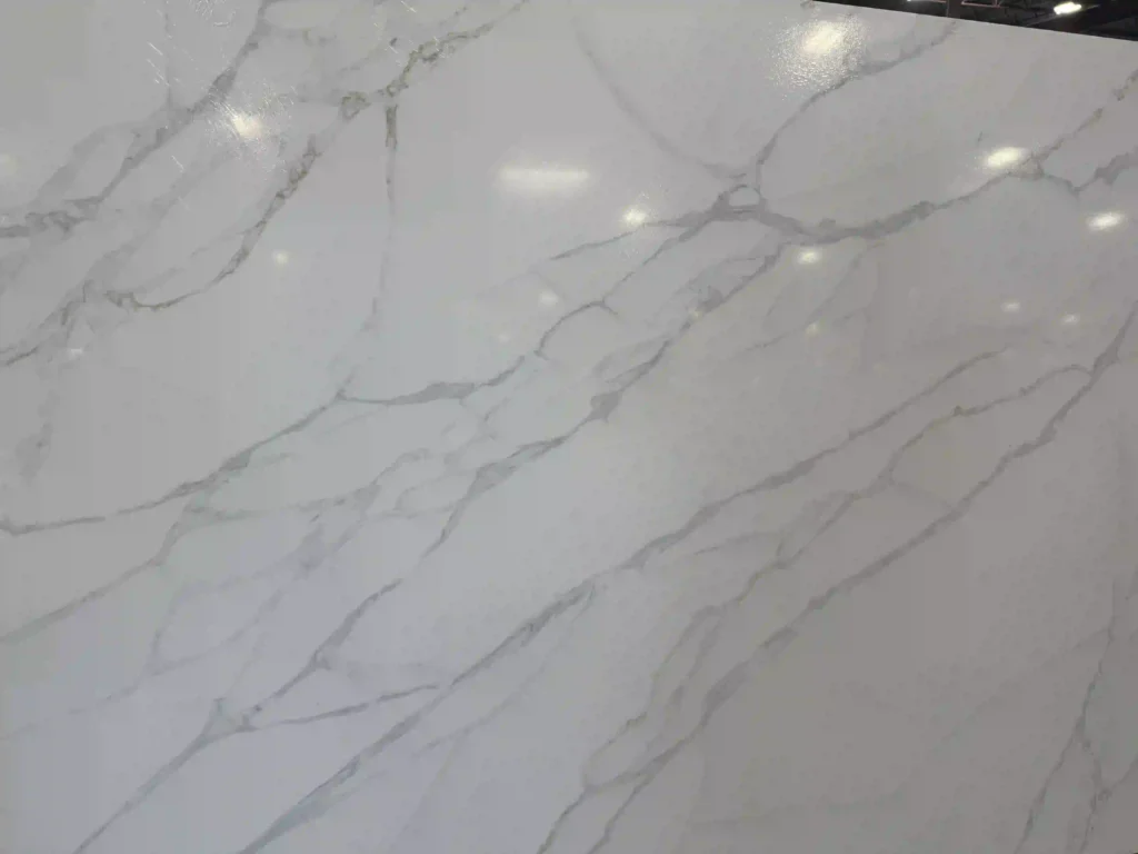 Kitchen Countertops granite, quartz countertops, Quartzite Countertops, Bathroom Countertops, Countertops Near me. Countertop installer. Quartz colors 

White & Light Quartz Colors
Alabaster – Soft, elegant white with a subtle warmth, perfect for creating a serene, airy atmosphere.
Antarctica – A pristine, icy white with a hint of sparkle, ideal for modern kitchen designs.
Carrara – Inspired by the luxurious Italian marble, featuring delicate veining for a sophisticated look.
Crystal White – A pure, clean white with a glossy finish, offering a sleek, minimalist vibe.
Arctic White – Cool and crisp, this white provides a bright, fresh look that makes spaces feel larger.
Pure White – A flawless white, perfect for creating a neutral and timeless aesthetic.
Snowy Mountain – Soft white with light gray undertones, mimicking the beauty of a snow-covered landscape.
Frost White – A frosty white with a matte finish that evokes a sense of calm and tranquility.
Cloud White – A warm, cloud-like white with a gentle sheen, creating a welcoming and soft atmosphere.
Polar Ice – A cool, frosty white with a subtle blue undertone, ideal for modern and contemporary designs.
Diamond White – A sparkling, radiant white that adds luxury and brightness to any space.
Winter Mist – A soft, cool white with a hint of gray, giving it a misty, ethereal quality.
Swan Lake – A creamy, soft white that mimics the elegance of swan feathers, perfect for bathrooms.
Bianco Cristallo – A clean, crystalline white with a delicate pattern, perfect for countertops that stand out.
White Sands – A warm, sandy white with soft golden hints, creating a light, coastal feel.
Lustrous White – A shiny, smooth white with a lustrous finish, adding sophistication to kitchens or baths.
Silver Mist – A cool, misty white with a touch of silver, providing an elegant, refined finish.
White Macaubas – A white quartz with grayish veins, offering a unique blend of elegance and natural beauty.
Ivory Cream – A creamy, soft ivory with a luxurious and smooth texture, ideal for creating warm, inviting spaces.
Calacatta White – Featuring bold gray veining against a white base, this color exudes luxury and timeless beauty.
Gray Quartz Colors
Concrete Gray – A modern, industrial gray that mimics the texture of concrete for a contemporary, edgy look.
Silverstone – A sophisticated silver-gray with light metallic flecks, adding a touch of glamour to countertops.
Shadow Storm – Dark gray with dramatic veining, perfect for creating a striking contrast in kitchen designs.
Platinum Gray – A refined gray with a soft metallic sheen, ideal for creating sleek, sophisticated kitchens.
Smoke Grey – A rich, smoky gray with deep undertones, perfect for contemporary, moody spaces.
Graphite – A dark, almost black gray with a smooth, matte finish that lends modern elegance to any design.
Charcoal Gray – A deep, charcoal color that adds drama and depth to any countertop, perfect for modern designs.
Cloudy Gray – A light, soft gray that gives a calm, airy feel, great for both traditional and contemporary kitchens.
Urban Grey – A modern, city-inspired gray with a balanced tone that complements various design styles.
Mystic Gray – A dark gray with rich undertones, giving an air of mystery and sophistication.
Moonlight Grey – A gentle gray with a subtle sheen, offering a soft glow that brightens any space.
Storm Grey – A deep, stormy gray with darker veining, perfect for bold, industrial-themed designs.
Cement – A neutral gray that mimics the look of cement, offering an urban, industrial vibe.
Ashen Gray – A cool, pale gray with subtle blue undertones, ideal for modern, minimalistic designs.
Flint Grey – A deeper gray with a refined, smoky hue, adding a sleek, stylish touch to any room.
Fog – A soft gray with a slightly foggy appearance, creating a relaxing, serene atmosphere.
Tungsten – A dark gray with a metallic finish, providing a striking, contemporary look.
Tornado – A deep, stormy gray that gives off a dramatic and bold presence in any setting.
Silver Tempest – A high-shine silver with dynamic veining, giving off a sense of motion and energy.
Dusty Gray – A soft, muted gray with a vintage feel, ideal for creating a timeless, understated look.
Beige & Cream Quartz Colors
Taupe – A warm beige with hints of gray, perfect for creating a neutral, inviting space.
Desert Beige – A light beige with warm undertones, giving a natural, earthy feel.
French Vanilla – A soft, creamy beige with a hint of yellow, offering a warm, inviting aesthetic.
Ivory Beige – A neutral beige with ivory undertones, offering a sophisticated and timeless design.
Oyster Pearl – A light, pearlescent beige with subtle gray undertones, perfect for modern kitchens and bathrooms.
Pebble Beige – A natural beige with gray undertones, creating a soft, organic look that complements rustic interiors.
Buttercream – A warm beige with yellow undertones, providing a soft and creamy feel.
Sandstone – A golden beige with hints of orange, offering an earthy, rustic appeal.
Cafe Latte – A rich, smooth beige with a coffee-inspired tone, perfect for cozy and inviting spaces.
Tuscany Beige – A Mediterranean-inspired beige with warm golden hues, ideal for rustic and Italian-style interiors.
Vanilla Bean – A soft, creamy beige with a touch of sweetness, perfect for neutral, versatile designs.
Mimosa – A light, sunny beige with a soft yellow tint, evoking warmth and cheerfulness.
Chai Latte – A beige with cinnamon and creamy undertones, offering a warm and soothing atmosphere.
Buttercup – A soft yellow-beige with a gentle, sunny undertone, great for creating bright, cheerful spaces.
Warm Taupe – A neutral taupe with subtle warmth, ideal for pairing with other earthy tones.
Golden Cream – A beige with golden undertones, perfect for luxurious, warm spaces.
Butter Croissant – A creamy beige with golden accents, adding a sophisticated touch to kitchens.
Cappuccino – A rich beige with coffee-colored undertones, offering a warm and cozy vibe.
Almond Butter – A soft beige with a rich, nutty tone that adds warmth to both modern and traditional designs.
Caramel – A rich, warm brownish-beige with hints of sweetness, great for creating inviting spaces.
Beige & Brown Quartz Colors
Brown Sugar – A sweet, warm brown with golden highlights, giving a rich and inviting atmosphere.
Cinnamon – A reddish-brown with a spicy tone, perfect for adding warmth and depth to your kitchen.
Café Mocha – A dark brown with velvety texture, ideal for creating a luxurious, grounded design.
Caramel Spice – A smooth caramel brown with a slight spice, offering a warm, sophisticated feel.
Maple Spice – A brown with a reddish tint, reminiscent of maple trees, perfect for cozy kitchens.
Café Brown – A deep, rich brown, perfect for rustic and traditional-style kitchens.
Fossil Brown – A muted, earthy brown with subtle speckling, giving it a natural stone-like appearance.
Cedar Brown – A rich, wood-inspired brown with red undertones, ideal for warm, natural spaces.
Golden Brown – A warm, golden-toned brown, adding a cozy feel to your kitchen or bathroom.
Toffee – A sweet, rich brown with buttery hints, perfect for creating a warm and luxurious space.
Sable Brown – A dark brown with cool undertones, ideal for creating a sophisticated and bold aesthetic.
Autumn Brown – A warm brown with orange and yellow highlights, evoking a fall-inspired palette.
Walnut – A dark, rich brown that adds depth and sophistication, great for traditional designs.
Maple Brown – A medium-toned brown with reddish undertones, perfect for creating a warm, inviting atmosphere.
Truffle – A dark, earthy brown with subtle undertones, perfect for creating a chic, modern look.
Cognac – A rich, amber brown with a smooth texture, ideal for luxurious and elegant interiors.
Ebony – A deep, dark brown with a cool undertone, perfect for a dramatic and refined look.
Mochaccino – A coffee-colored brown with creamy undertones, great for creating a soothing, cozy atmosphere.
Sienna Brown – A reddish-brown with rustic, earthy undertones, perfect for warm, natural designs.
Cinnamon Swirl – A warm, golden brown with cinnamon undertones, offering a comforting and inviting feel.
Black Quartz Colors
Jet Black – A deep, pure black, perfect for sleek, high-end designs.
Midnight Black – A rich black with a glossy finish, ideal for luxurious and modern spaces.
Black Diamond – A jet-black color with sparkling specks, giving a touch of glamour and drama.
Onyx – A deep black with a glossy finish, perfect for bold and elegant designs.
Carbon Black – A smooth, matte black, ideal for contemporary and minimalist spaces.
Unique Quartz Colors
Crystal Storm – A light gray quartz with silver streaks and sparkles, creating a stormy, dynamic look.
Lava Flow – A fiery red quartz with black veining, perfect for creating a bold statement.
Blue Ice – A soft, icy blue quartz with frosty undertones, ideal for a fresh, modern look.
Tropical Breeze – A cool blue-green quartz with subtle veining, evoking a tropical coastal feel.
Emerald Forest – A deep green quartz with rich flecks, perfect for creating a natural, earthy vibe.
Golden Nugget – A rich gold with brown speckles, creating a luxurious and warm countertop.
Twilight Glow – A deep purple with subtle iridescent specks, perfect for adding a mystical touch.
Autumn Leaves – A warm orange-brown with red veins, mimicking the colors of fall leaves.
Coral Reef – A soft coral-colored quartz with light marbling, perfect for kitchens with a coastal vibe.
Sapphire Dreams – A blue quartz with swirls of white, creating a dreamy, serene atmosphere.
Lavender Mist – A soft purple with cool undertones, perfect for a calming, modern look.
Garnet Sparkle – A deep red quartz with sparkling flecks, perfect for adding drama and luxury.
Amethyst Blaze – A rich, purple quartz with veining that evokes the look of precious stones.
Golden Horizon – A warm, golden quartz with streaks of white and amber, perfect for a welcoming vibe.
Iridescent White – A shimmering white quartz with subtle color-changing effects, adding elegance and sophistication.