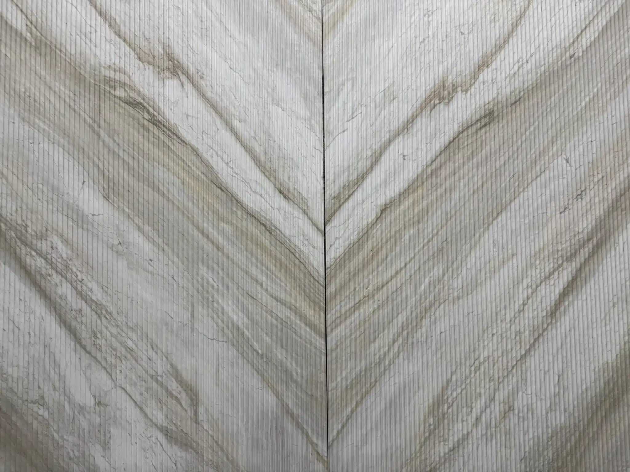 Stunning Taj Mahal quartzite island centerpiece in a full-scale home remodeling project.