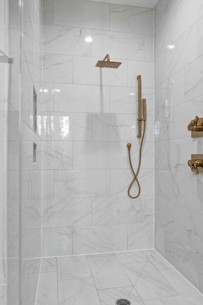 Elegant marble shower featuring contemporary gold fixtures and sleek design.
If you are looking for the best granite countertops near me or need quartz countertop installers near me, our Kingwood team is ready to help. We provide affordable kitchen countertops near me and luxury marble slabs near me for every budget. Homeowners searching for countertop fabricators near me or custom stone specialists near me trust our local expertise. We offer bathroom vanity installation near me, quartzite countertop shops near me, and granite remnants near me for smaller projects. For those planning a backyard upgrade, we are the top choice for outdoor kitchen countertops near me and stone barbecue tops near me. Our services include undermount sink installation near me, granite repair services near me, and full backsplash installers near me. If you need commercial countertop contractors near me or residential stone surfaces near me, we serve the entire local area. Residents often find us by searching for countertop showrooms near me, local stone yards near me, and best countertop companies near me. Whether you need waterfall island fabrication near me, discount granite near me, or premium quartz near me, we provide free countertop quotes near me. We also handle sink cutout services near me, countertop sealing near me, and stone restoration near me. As your local kitchen remodelers near me and home upgrade specialists near me, we are the preferred countertop shop near me for custom countertops near me and stone countertop replacement near me. From emergency countertop repair near me to new construction stone work near me, we are the contractor near me providing quality stone surfaces near me and professional countertop mounting near me in the Kingwood area.
