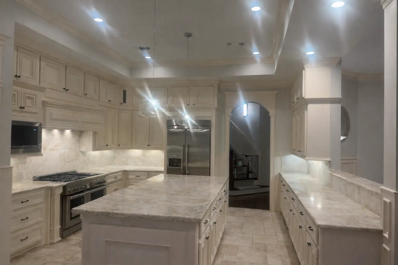 Luxury bathroom renovation featuring custom quartzite countertops and tile shower in Houston, Tx, Katy, Tx, and Fulshear, Tx