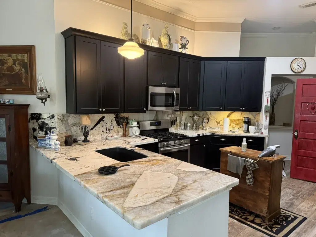 kitchen countertops
Custom tile shower walls and marble accents for a designer bathroom renovation
